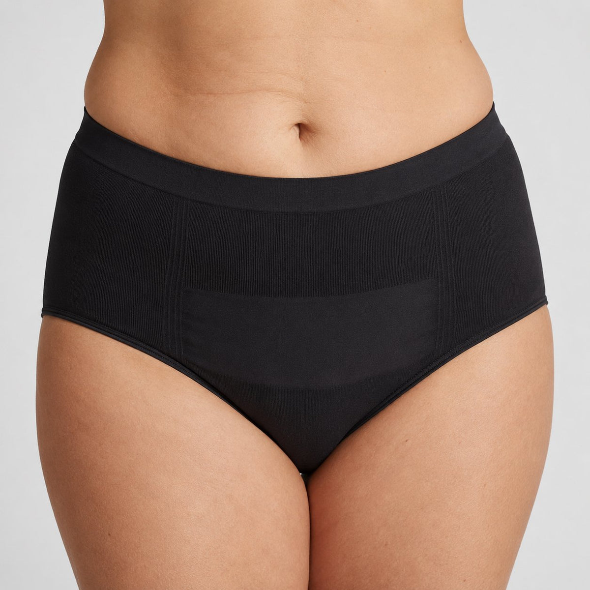 Black high-waisted C-section recovery briefs worn front-on, waistband sitting above the incision line